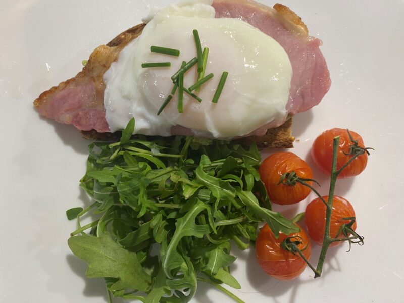 Goodwin Guest House in Keswick Lake District B B Breakfast Poached egg and dry cured bacon on smashed avocoado and sourdough toast with vine ripended tomatoes rocket salad and chives Goodwin House B&B, Keswick