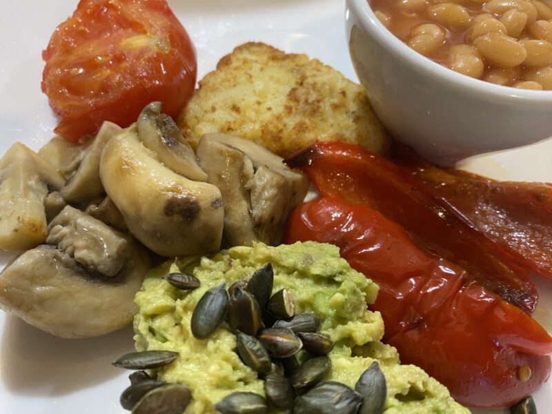 Goodwin Guest House VG Breakfast Smashed avocado with toasted pumpkins seeds roasted red peppers sauteed mushrooms hash brown grilled vine tomato and baked beans Goodwin House B&B, Keswick